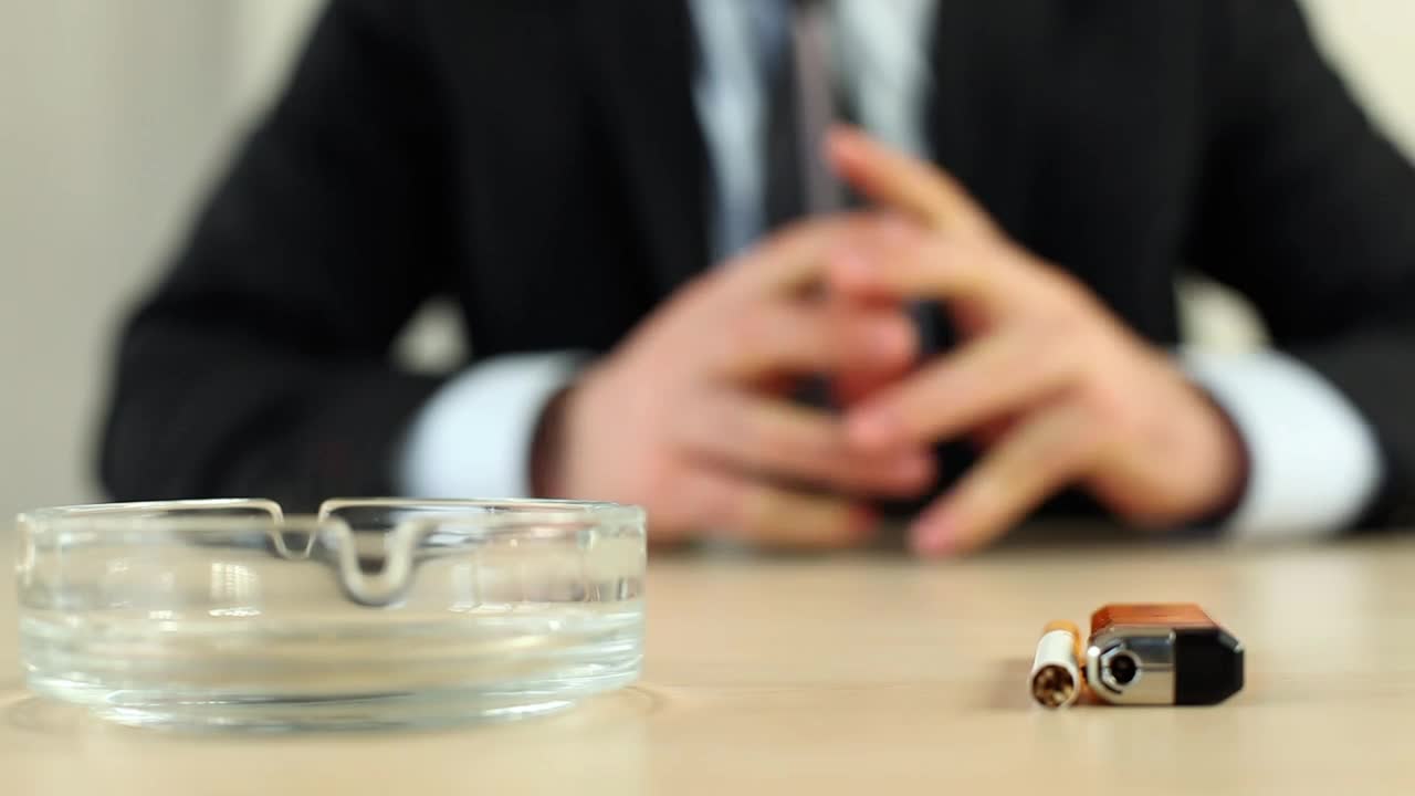 Stock Video Man In Suit Lights A Cigarette And Starts Smokin Animated Wallpaper - Free Download