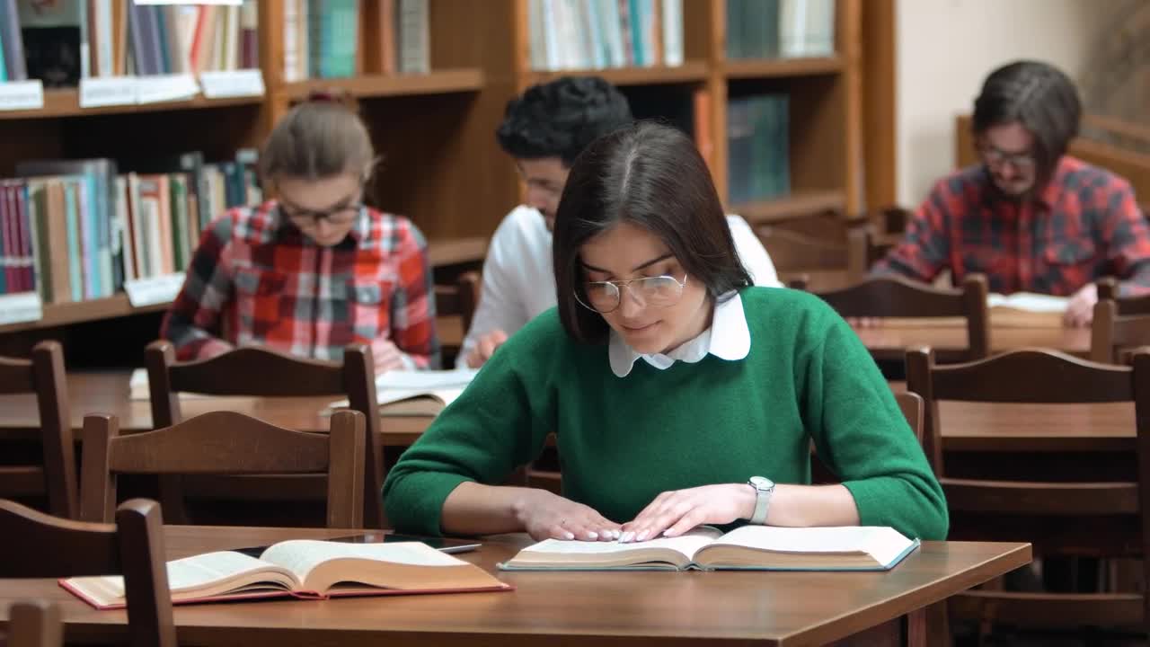 Free Video Stock Students Do Academic Research In College Library Live Wallpaper - Free Download