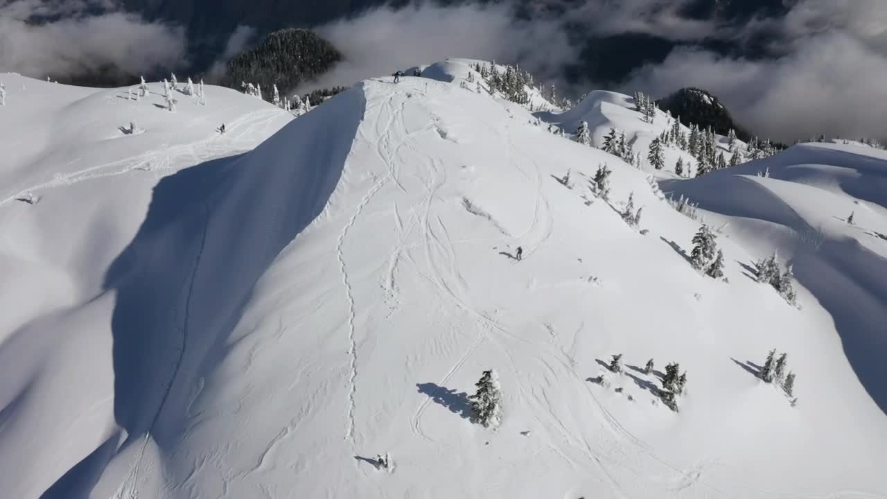 Free Video Stock Skiers Going Down A Canadian Mountain Live Wallpaper - Free Download