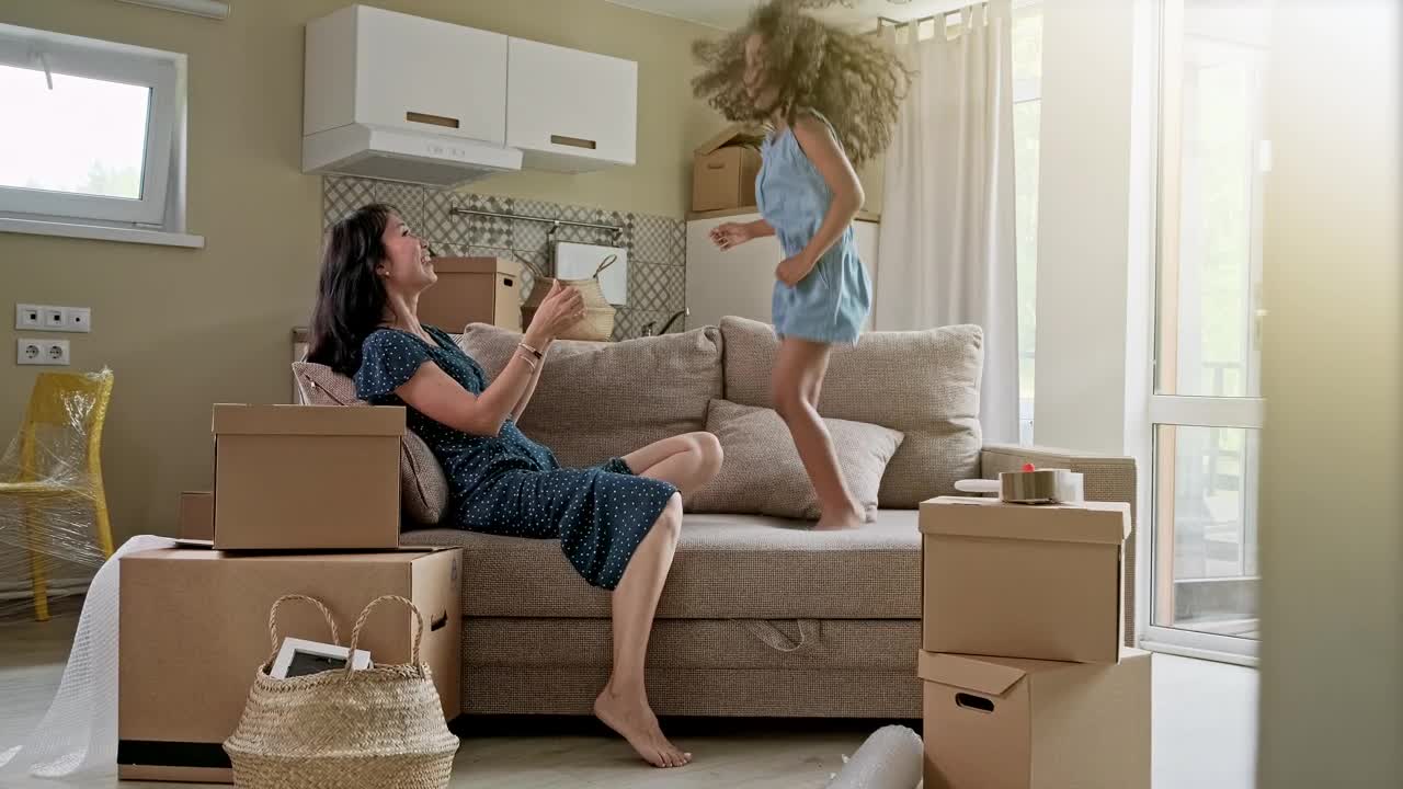 Stock Footage Very Happy Mother And Daughter In Their New Home Live Wallpaper - Free Download