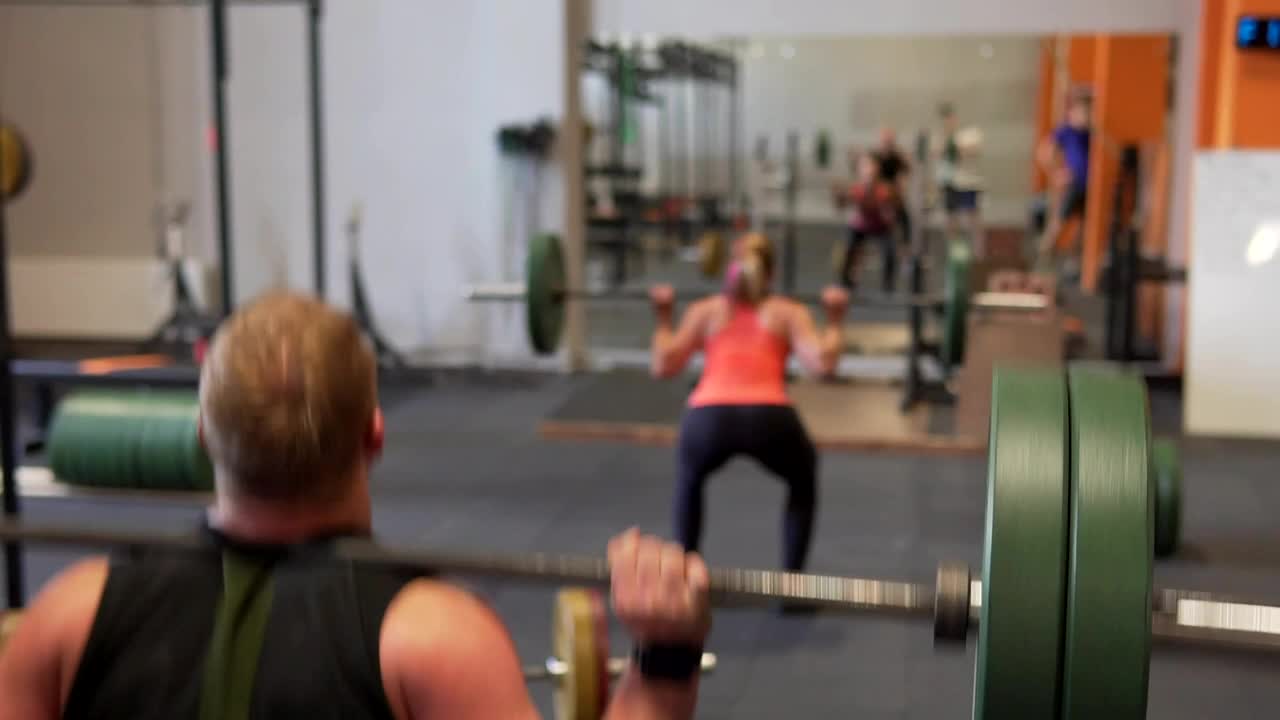 Stock Video Lifting Weights In The Gym Animated Wallpaper - Free Download