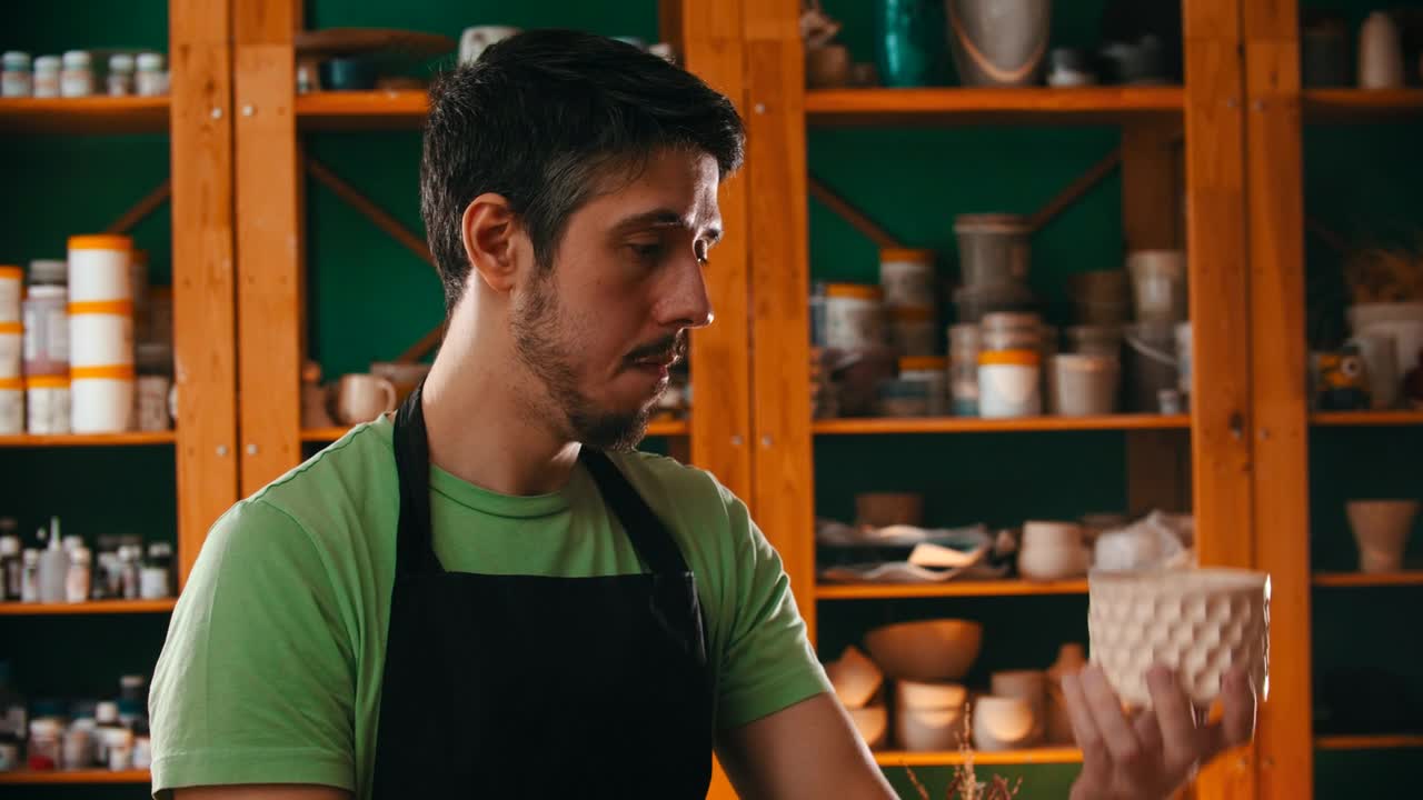 Video Stock Pottery Master Examining A Clay Pot Live Wallpaper Free - Free Download