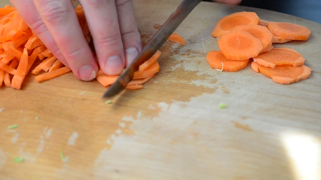 Stock Video Cutting Up Carrots Into Small Chunks Live Wallpaper For PC - Free Download