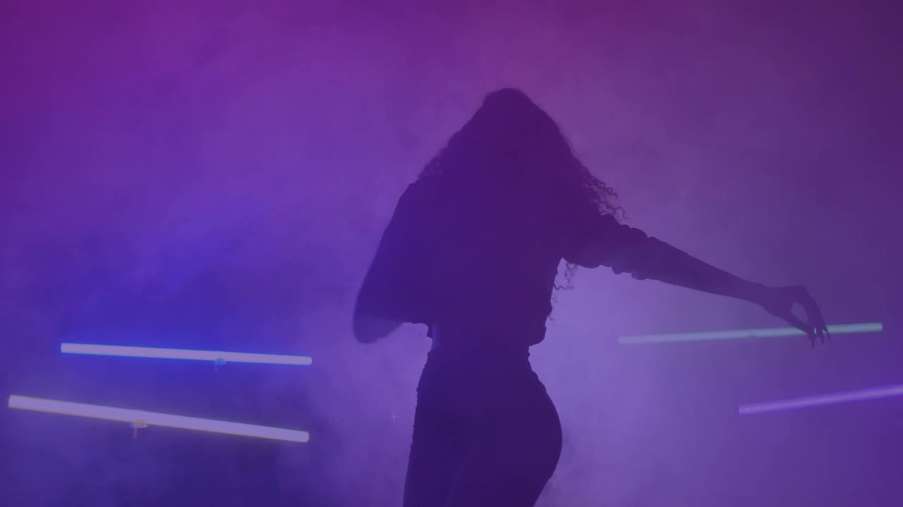 Free Stock Video Silhouette Of A Girl Dancing Energetically In The Dark Live Wallpaper - Free Download