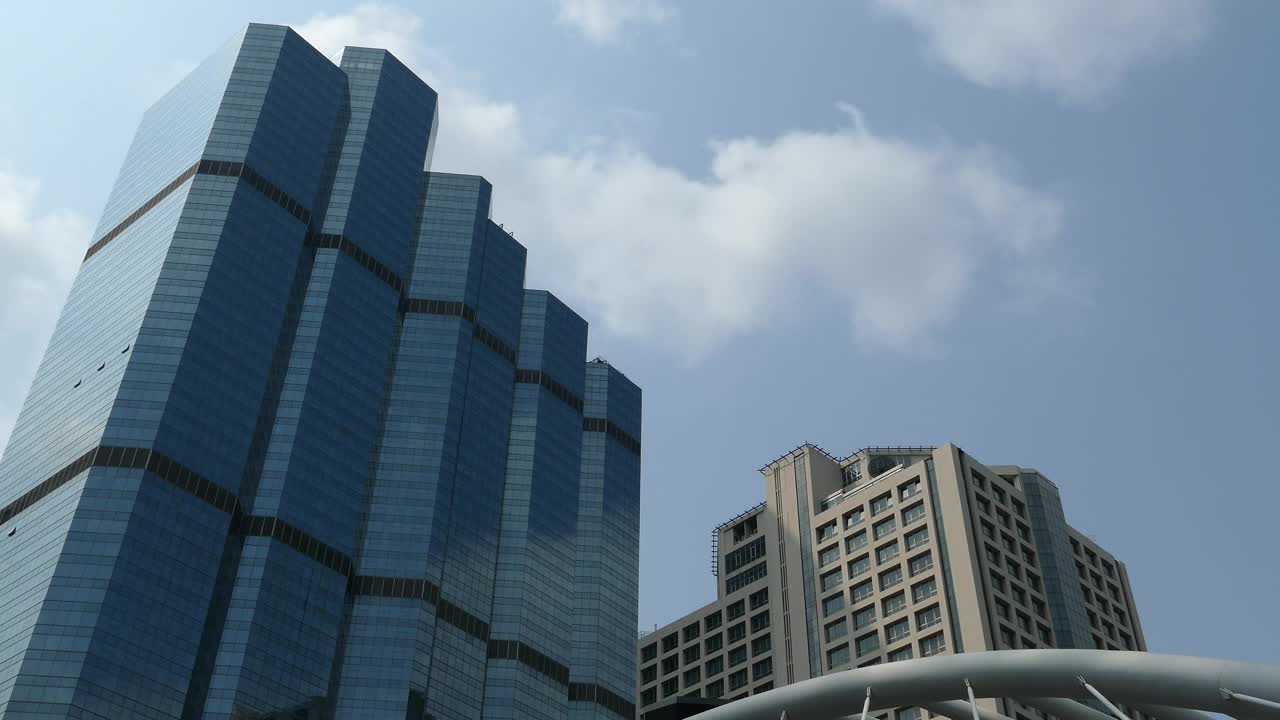 Free Video Stock time lapse of skyscrapers next to the sky walk in bangkok Live Wallpaper - Free Download