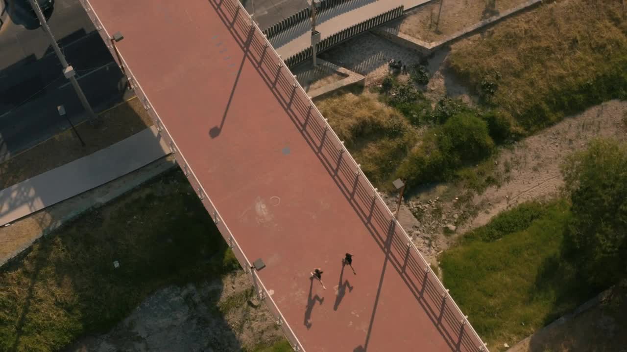 Free Stock Video Two People Jogging Across A Footbridge Live Wallpaper - Free Download
