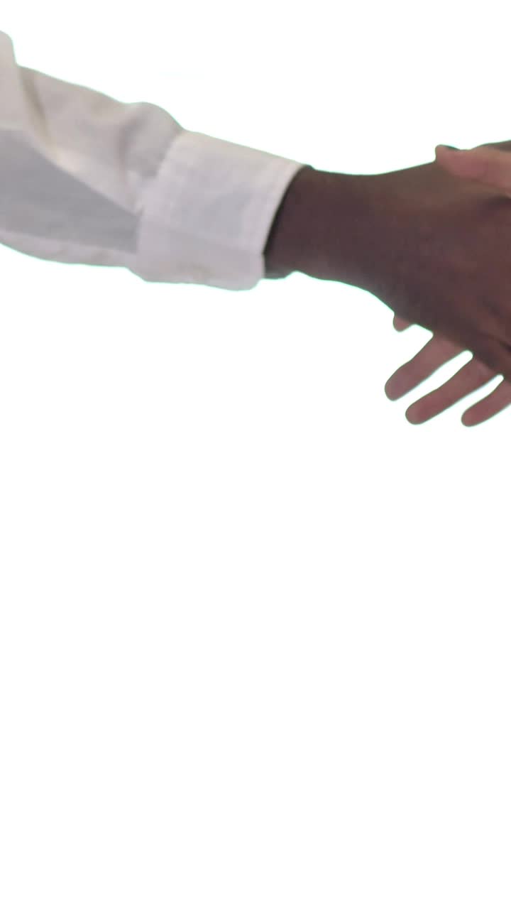Stock Video People Hands Giving A Handshake On A White Background Live Wallpaper - Free Download