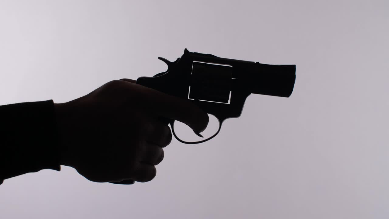 Free Stock Video Silhouette Of A Hand Firing A Revolver Live Wallpaper - Free Download