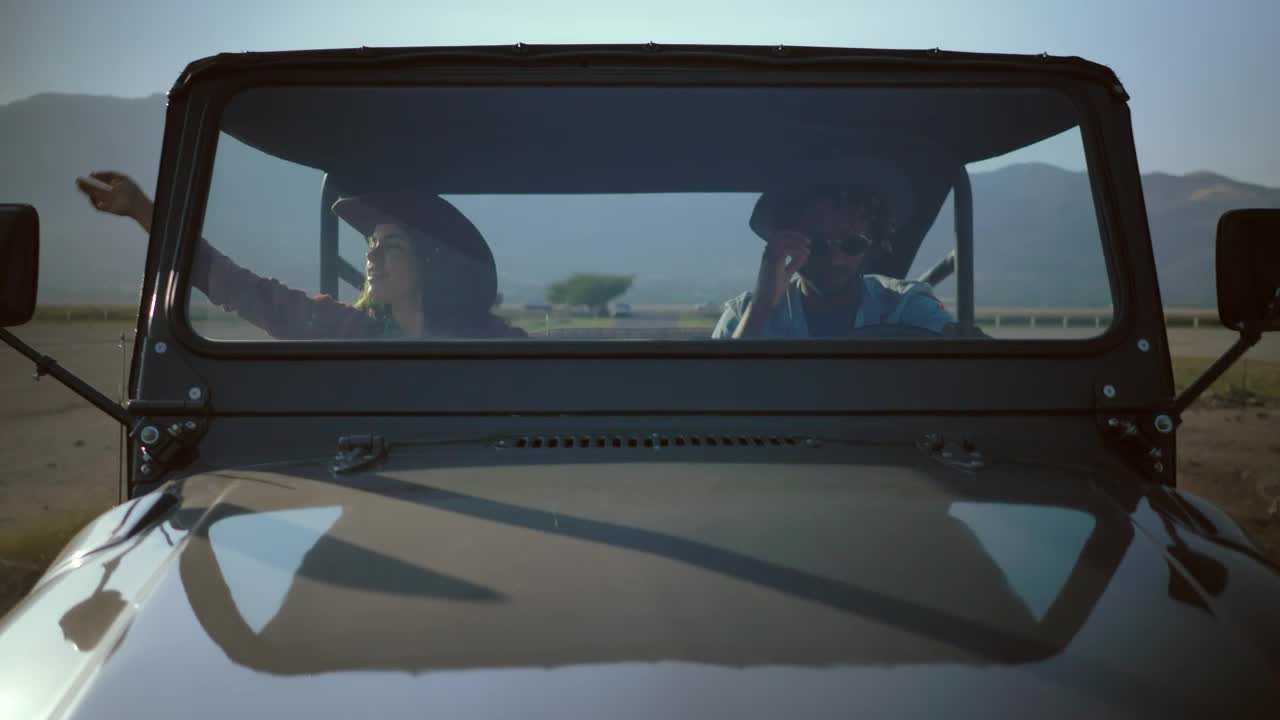Stock Video Couple Traveling Down A Road In A Jeep Live Wallpaper For PC - Free Download