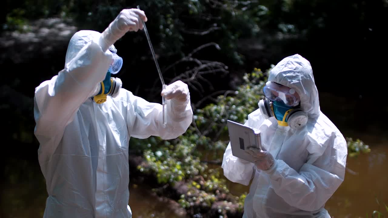 Stock Video Collecting Water Samples In Biohazard Suits Live Wallpaper For PC - Free Download