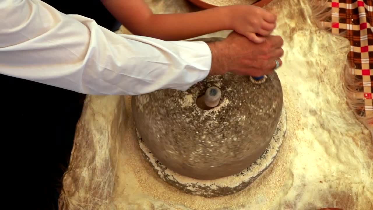 Stock Video Making Wheat Flour In A Rotating Stone Animated Wallpaper - Free Download