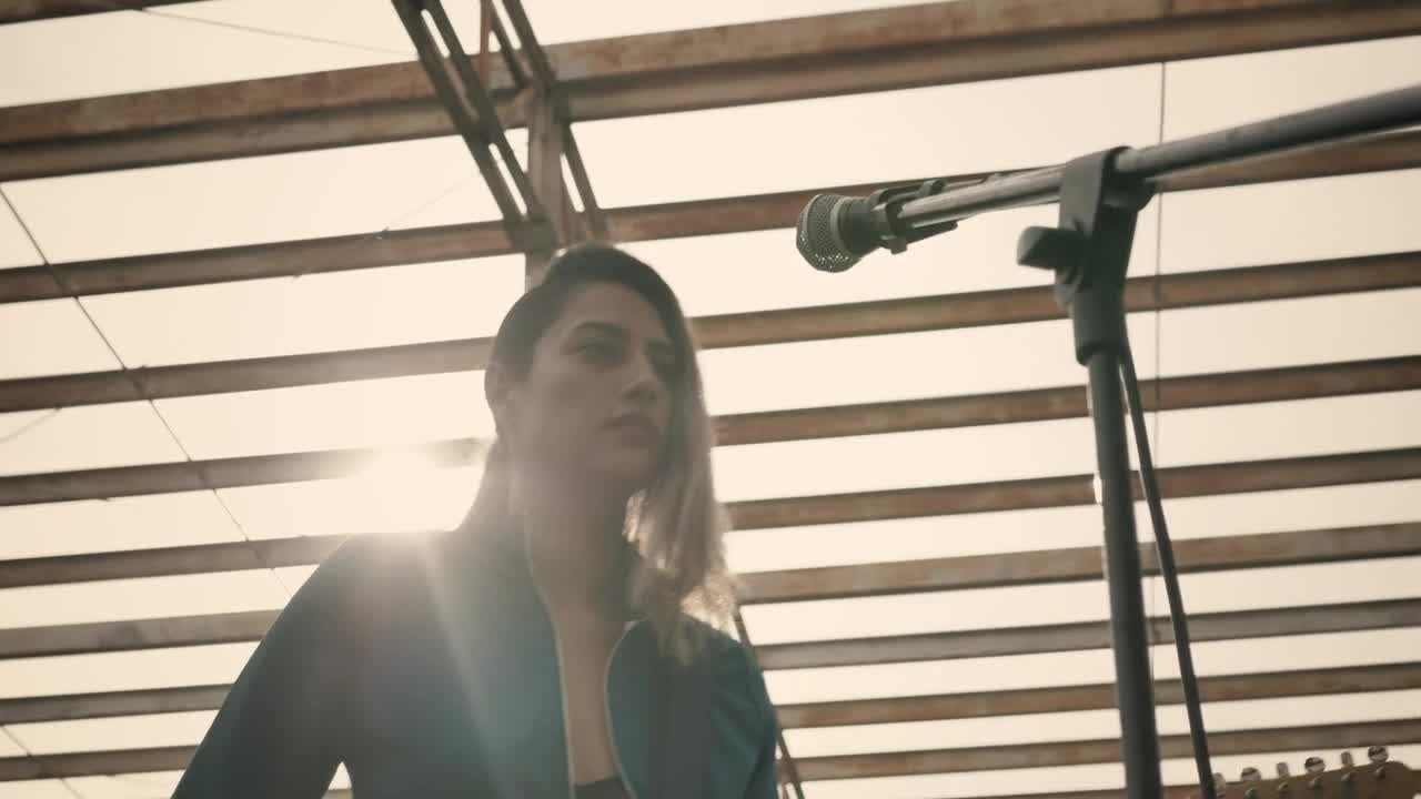 Stock Footage Vocalist And Guitarist Of A Rock Band Singing Live Wallpaper - Free Download