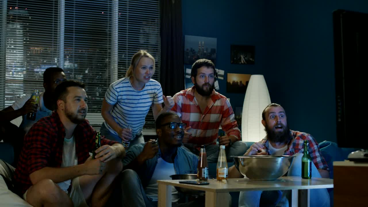 Stock Video Exciting Fans Cheering For Sports On The Tv Live Wallpaper For PC - Free Download