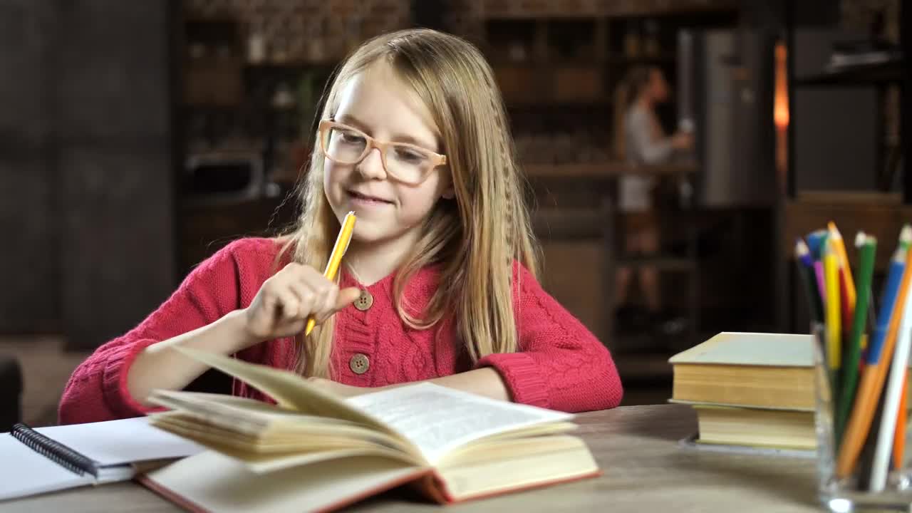 Stock Video Happy Child Doing Her Homework Animated Wallpaper - Free Download