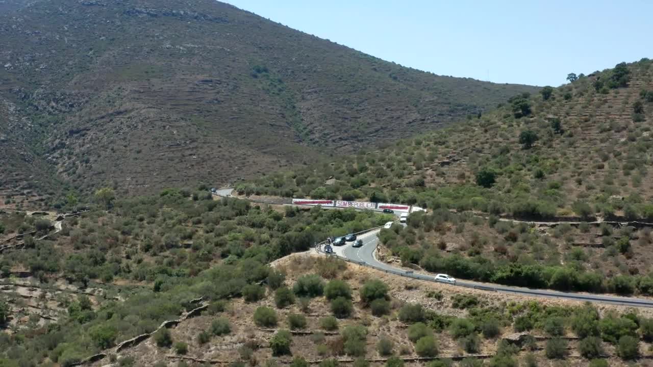 Stock Video Drone Flying Along A Winding Road In The Hills Live Wallpaper For PC - Free Download
