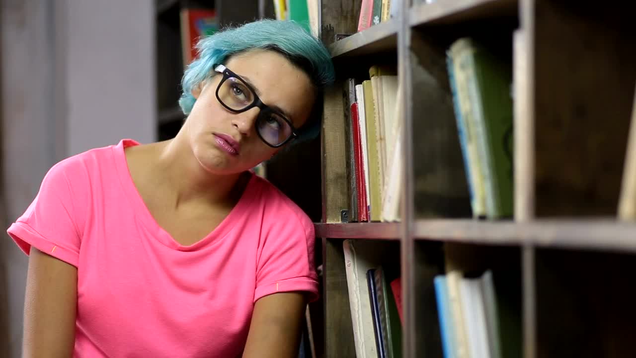Free Video Stock Stressed Student In The Library Live Wallpaper - Free Download