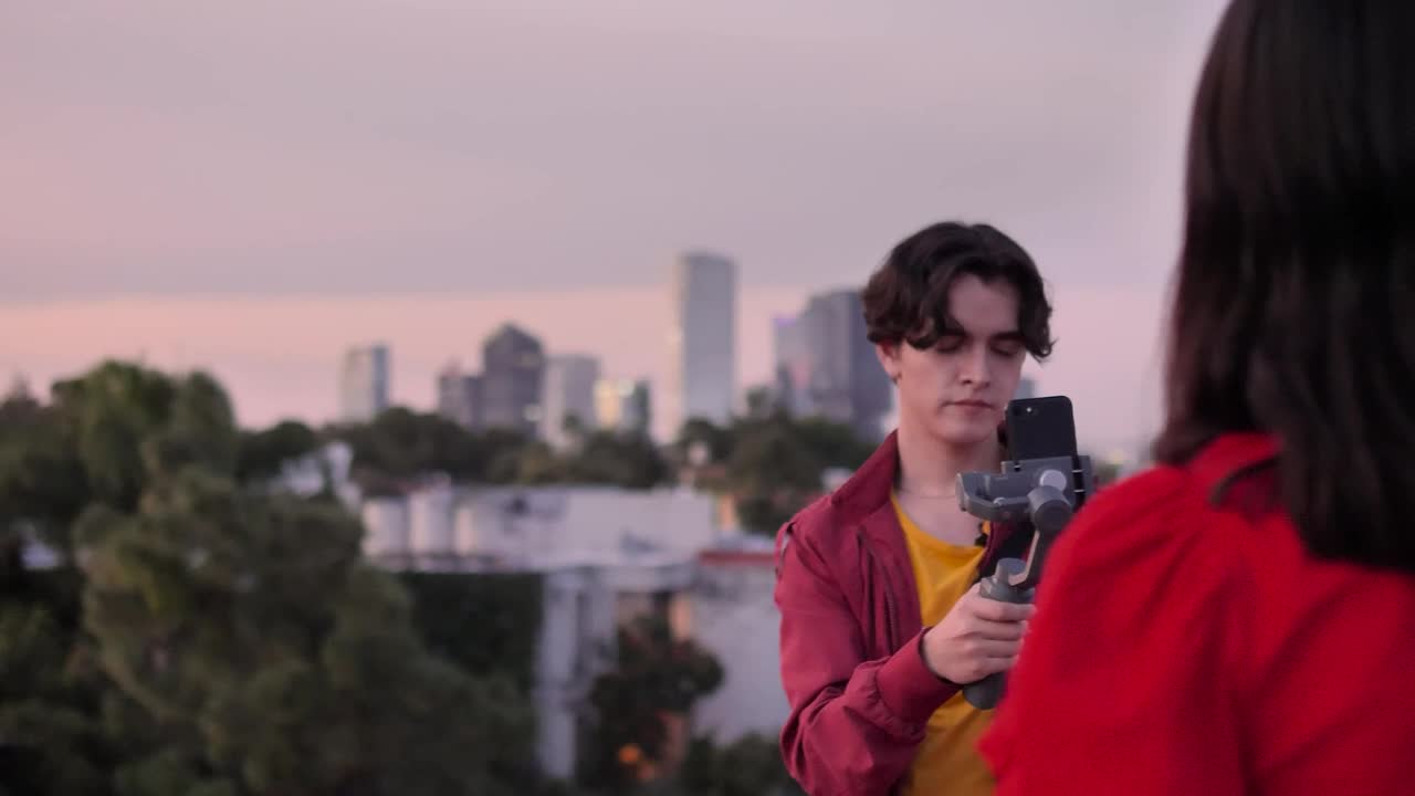Stock Video Filming A Girl On Top With City Background Live Wallpaper For PC - Free Download