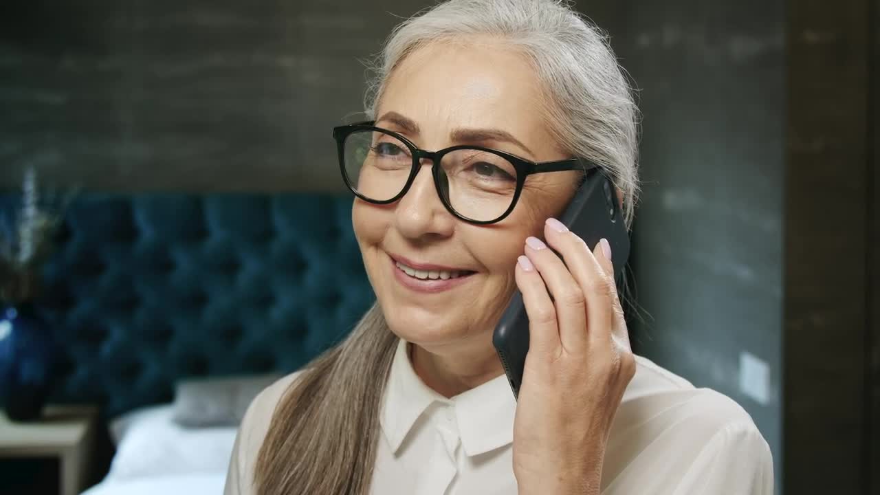Stock Video Beautiful Elderly Woman Chats On Mobile Phone Live Wallpaper For PC - Free Download