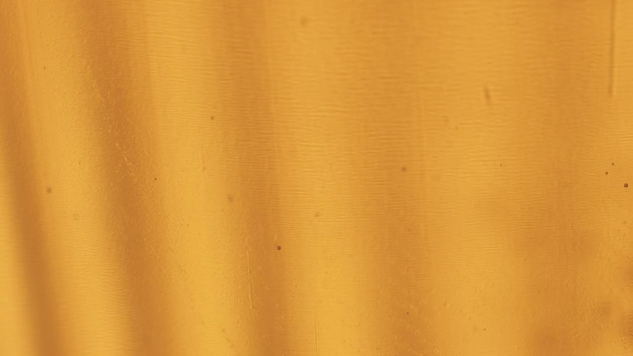 Free Video Stock Small Bubbles In A Liquid On A Yellow Background Live Wallpaper - Free Download