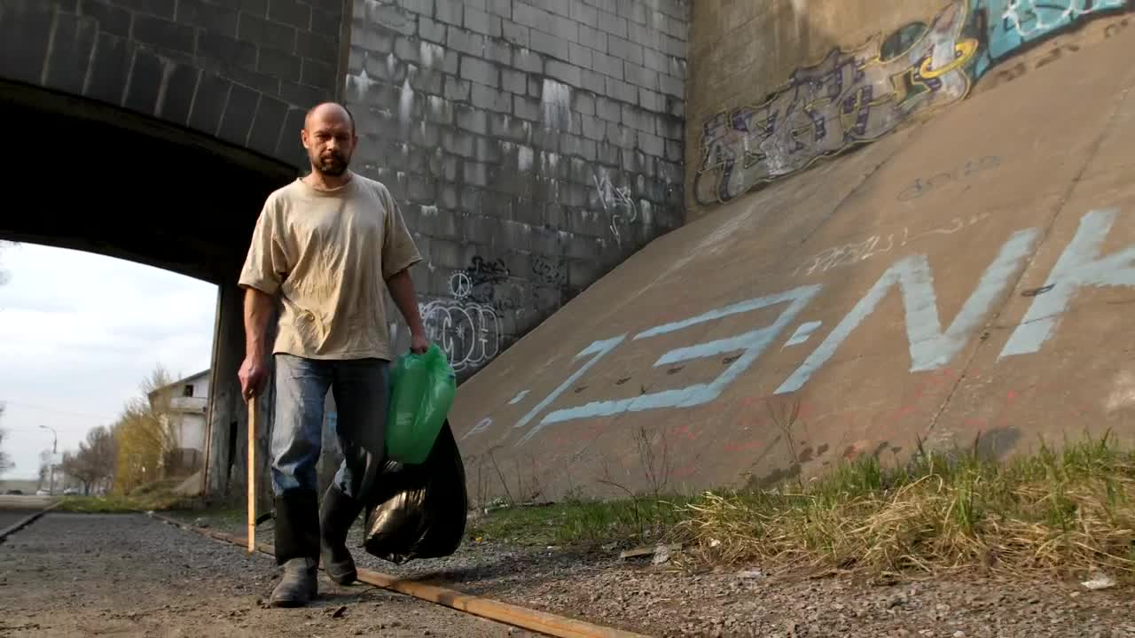 Stock Video Homeless Man Walking With Bags Animated Wallpaper - Free Download