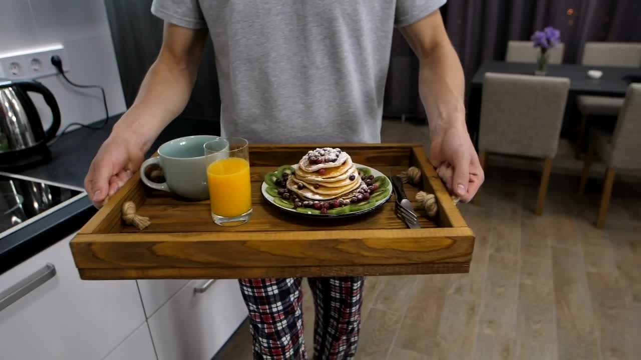 Stock Video Man Taking A Breakfast Tray To His Wif Animated Wallpaper - Free Download