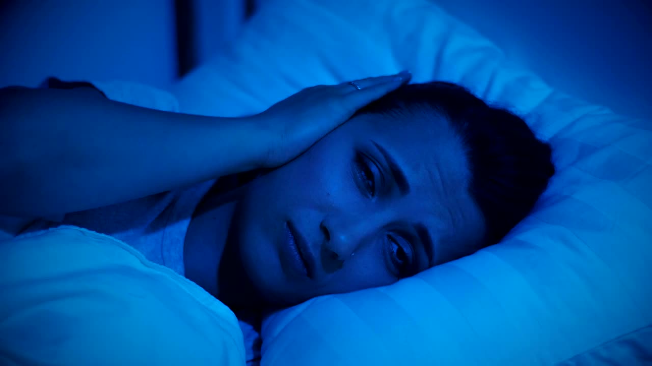 Free Stock Video Woman In Her Bed Unable To Sleep Due To The Live Wallpaper - Free Download