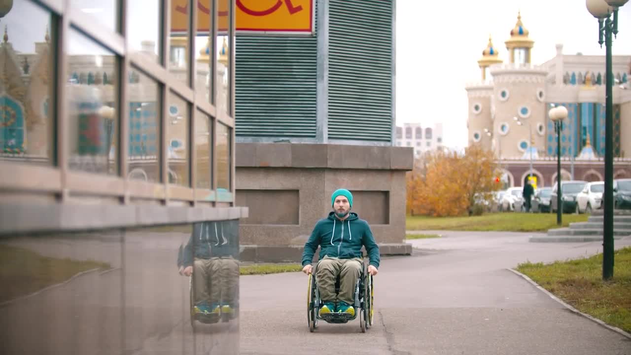 Stock Video Disabled Man In A Wheelchair And A Disabled Sign Live Wallpaper For PC - Free Download