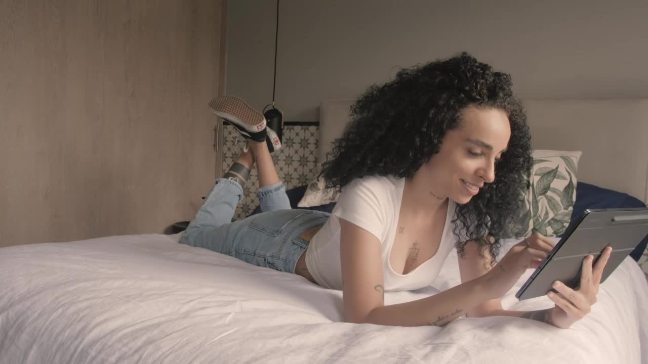 Stock Video Happy Woman Talking On Video Call On A Tablet Animated Wallpaper - Free Download