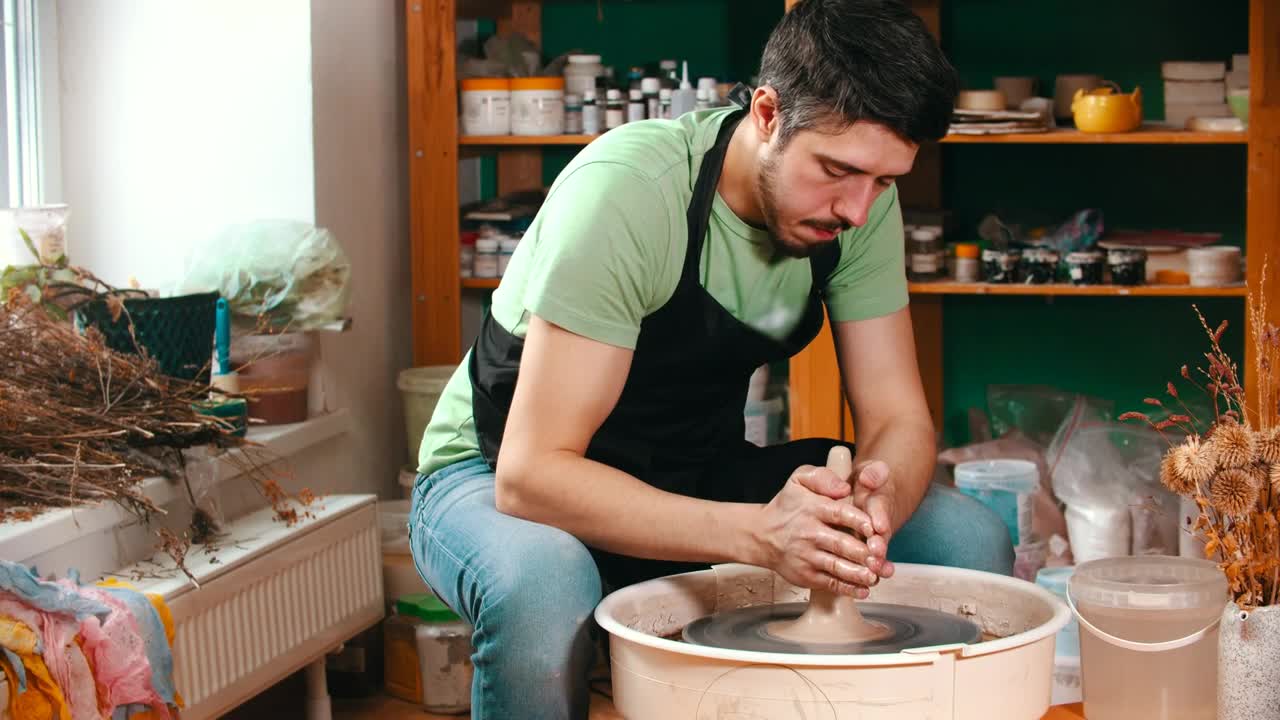 Stock Video Man Working With Clay In The Pottery Studi Animated Wallpaper - Free Download