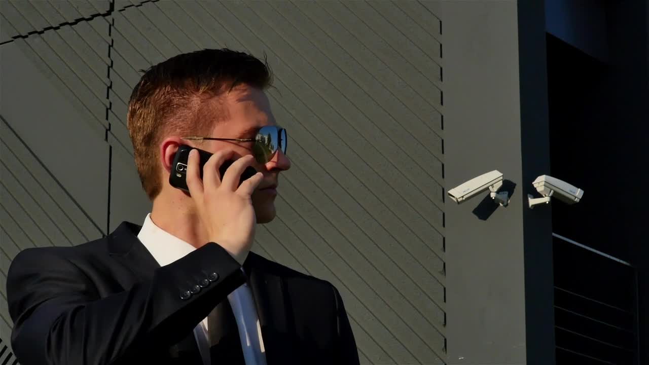 Free Video Stock Special Agent Talking On The Phone Live Wallpaper - Free Download