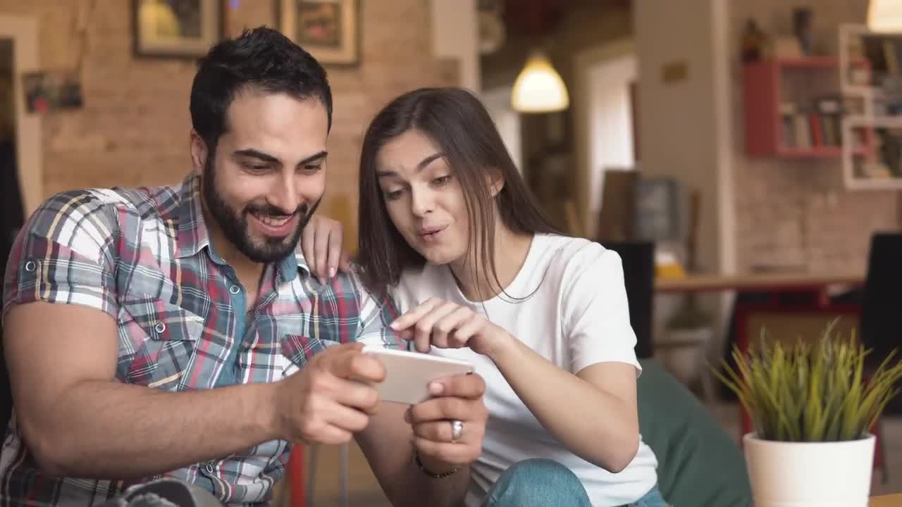 Stock Video Friends Enjoy Mobile Gaming On Break Live Wallpaper For PC - Free Download