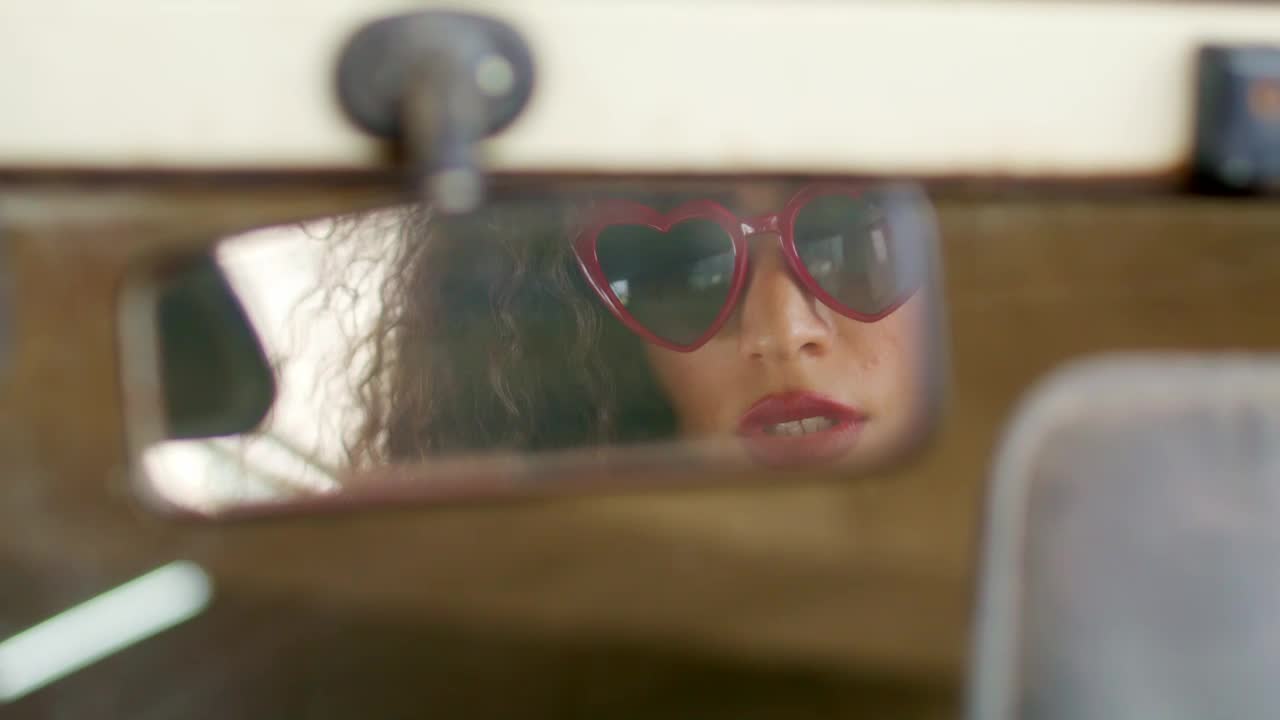 Free Stock Video Woman Looking In Rear View Mirror Live Wallpaper - Free Download