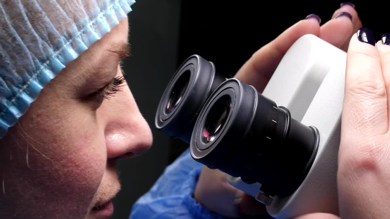 Free Stock Video Researcher Using Her Microscope Live Wallpaper - Free Download