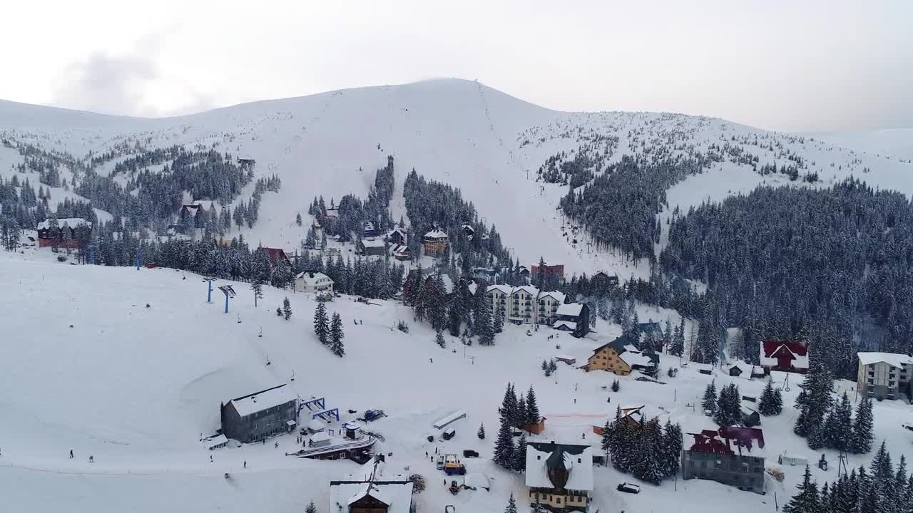 Free Video Stock Small Town On The Slopes Of The Snowy Mountains Live Wallpaper - Free Download