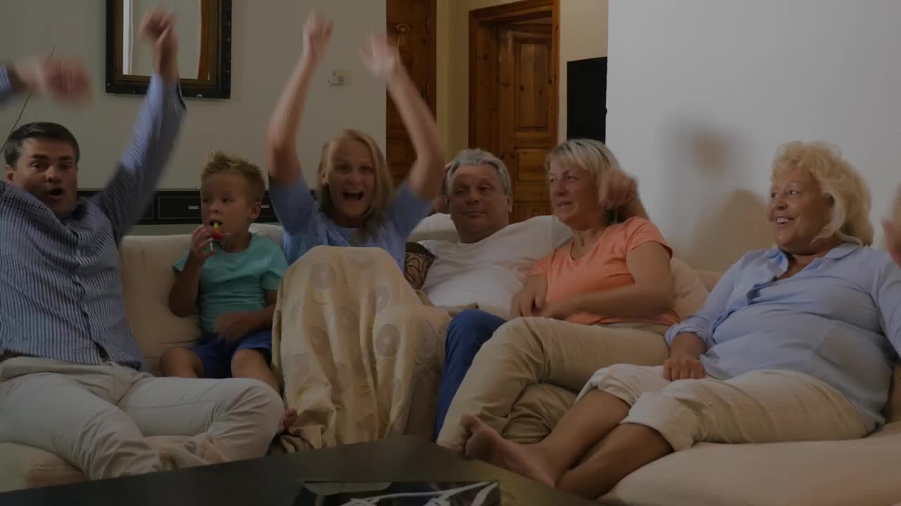 Stock Video Family Celebrating A Goal On Tv Live Wallpaper For PC - Free Download