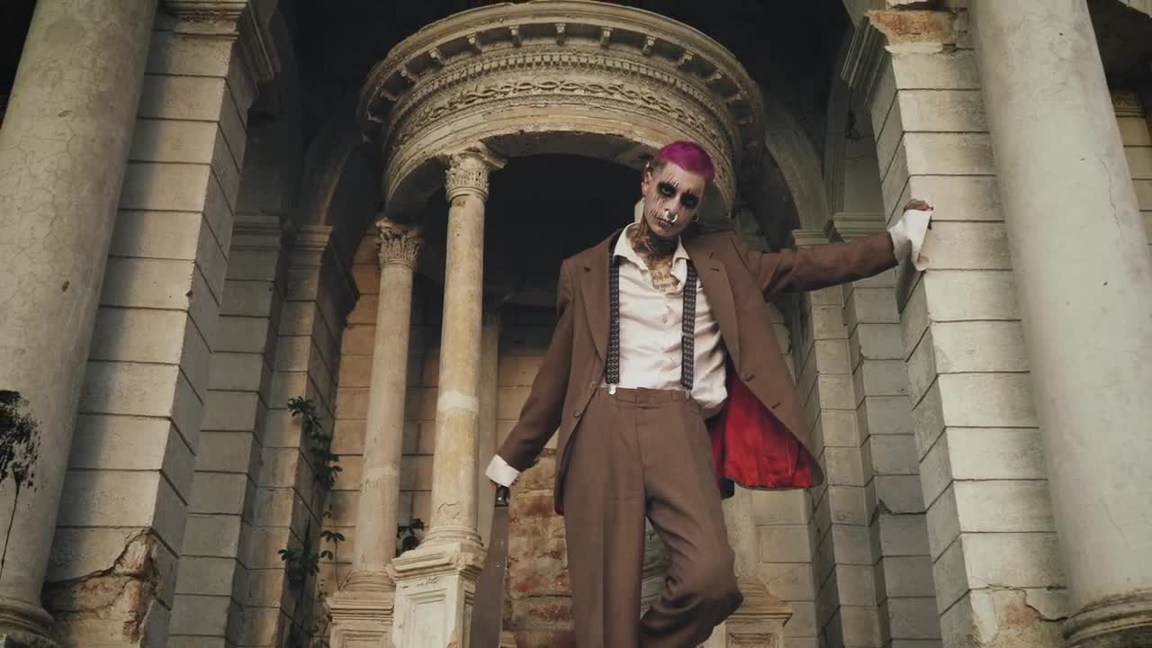 Stock Video Crazy Joker Standing Amongst Ruins Live Wallpaper For PC - Free Download