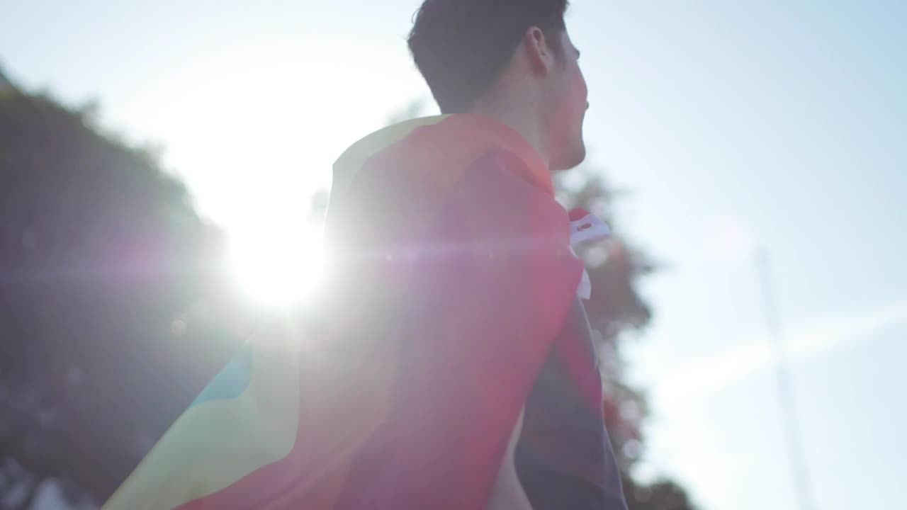 Stock Video Man With Pride Rainbow Flag Around His Nec Animated Wallpaper - Free Download