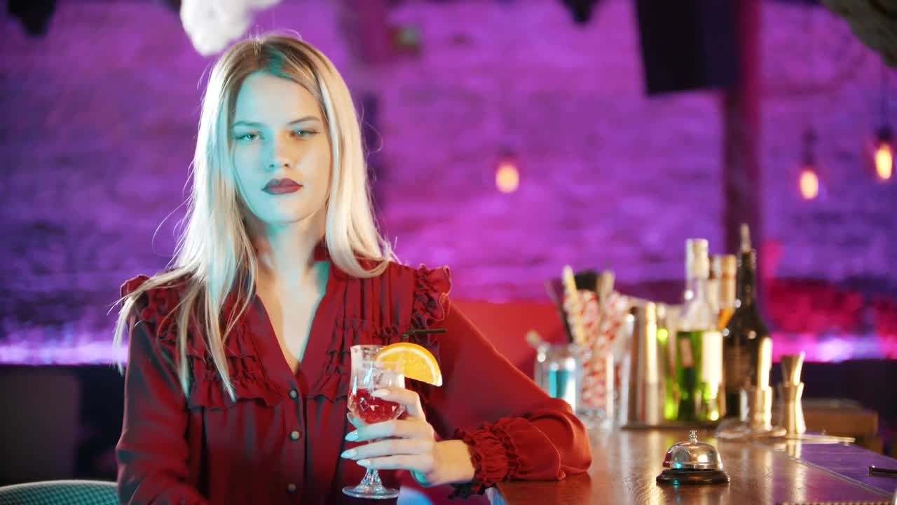 Video Stock Captivating Woman With A Drink At A Bar Counter Live Wallpaper For PC - Free Download