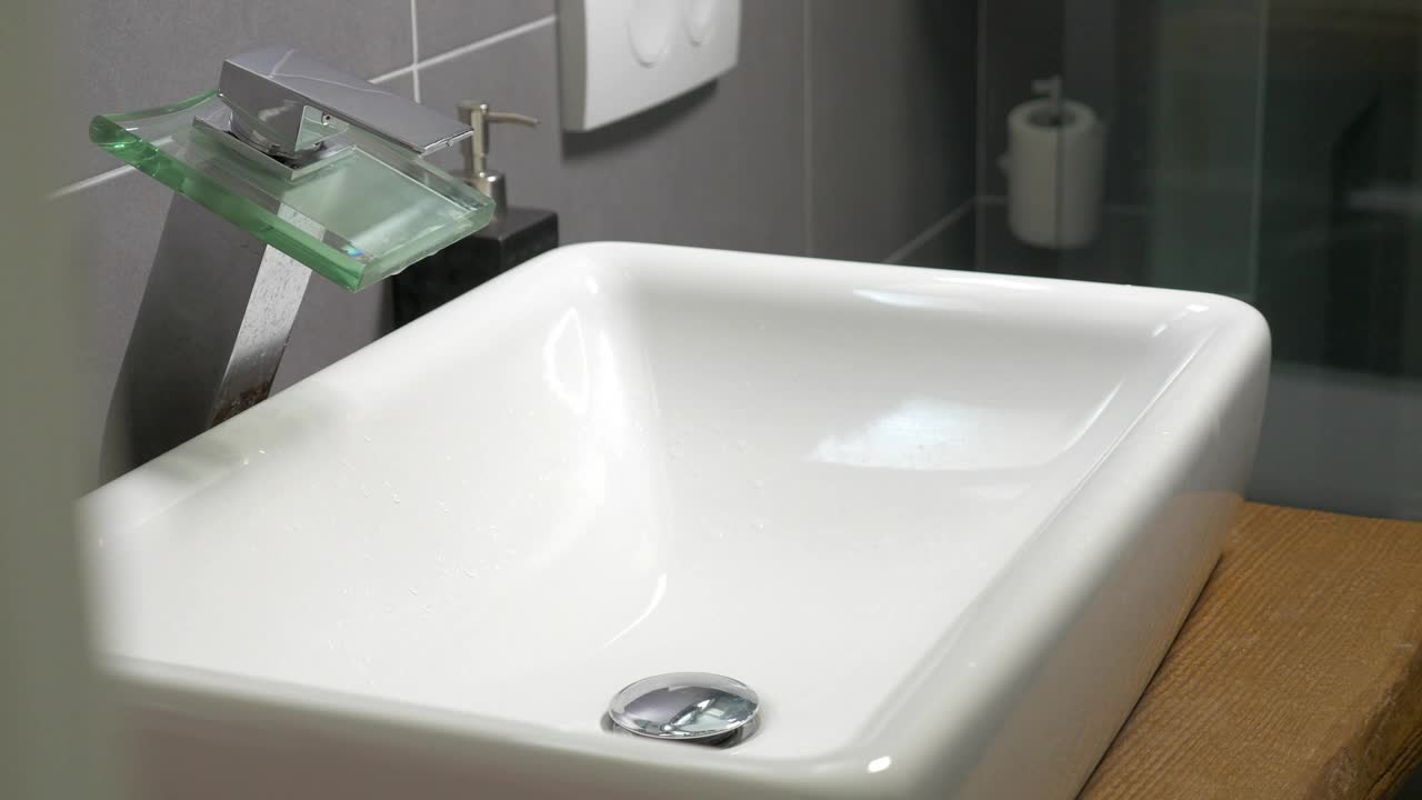 Stock Footage Washing In A Modern Sink Live Wallpaper - Free Download