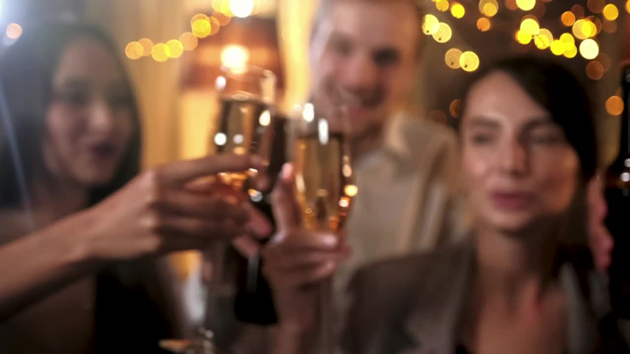 Video Stock Closeup Of Friends Toast With Champagne And Holiday Lights Live Wallpaper For PC - Free Download