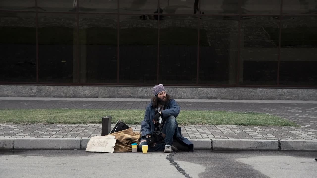 Video Stock Businessman Offers A Job To Homeless Man Live Wallpaper For PC - Free Download