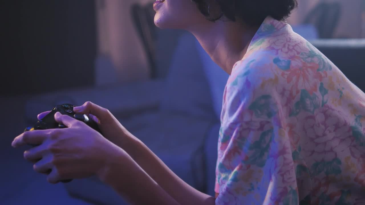 Free Video Stock teen playing video games in the living room Live Wallpaper - Free Download