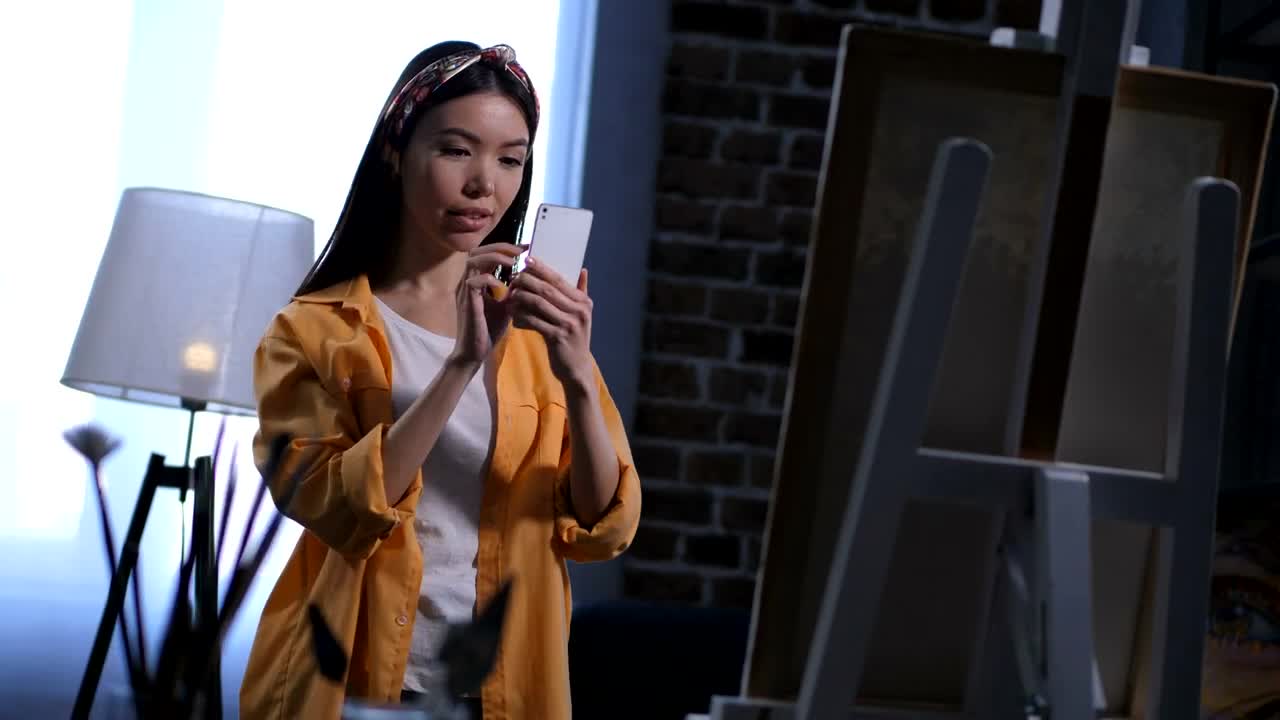 Stock Video Painter Taking A Picture Of A Painting Live Wallpaper - Free Download