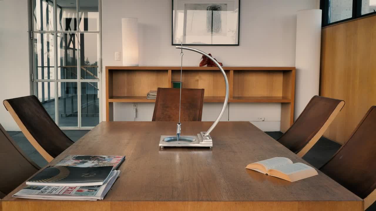 Stock Video Minimalist Room With Coffee Table With Books And Magazine Animated Wallpaper - Free Download