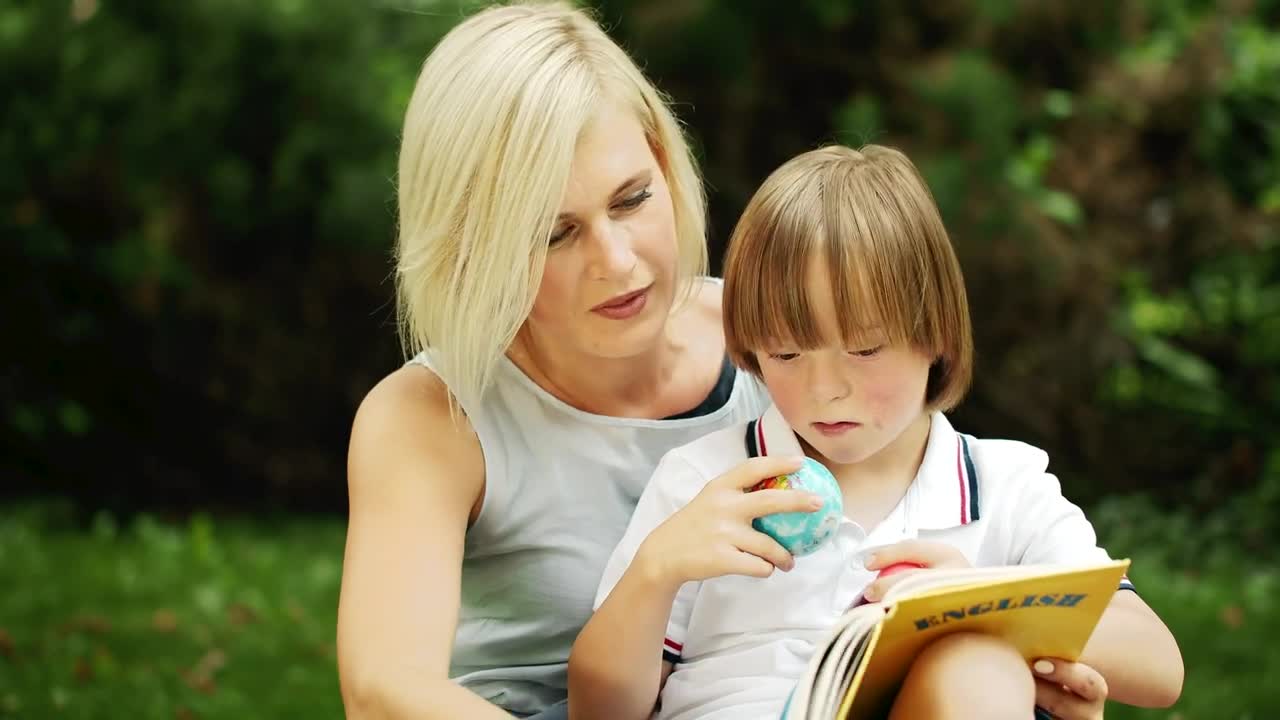 Stock Video Mom Helps Little Boy With English Educatio Animated Wallpaper - Free Download