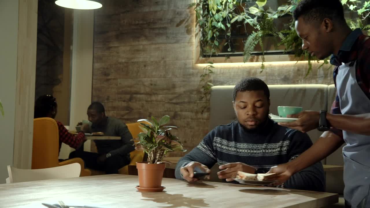 Stock Footage Waiter Bringing The Tea To The Customer Live Wallpaper - Free Download