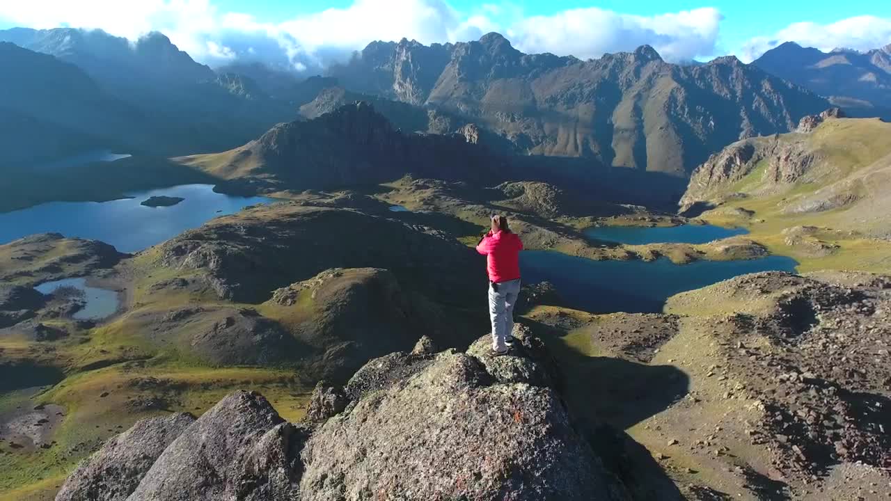 Video Stock Photographer Working At The Top Of A Mountain Peak Live Wallpaper Free - Free Download