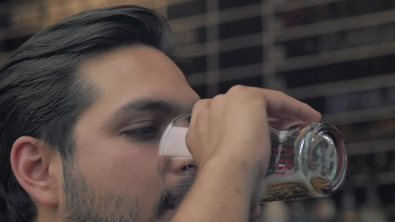 Stock Video Man Drinking Beer From A Glass Animated Wallpaper - Free Download