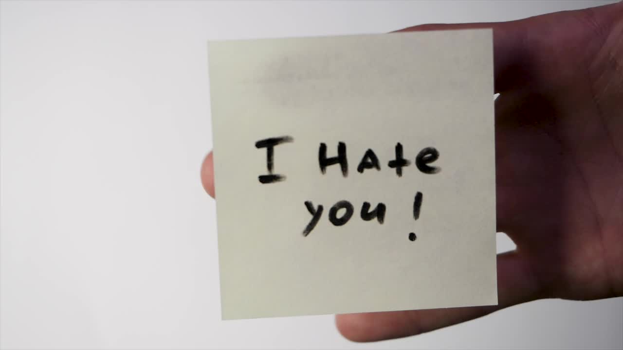 Stock Video Insult Written On A Note Animated Wallpaper - Free Download