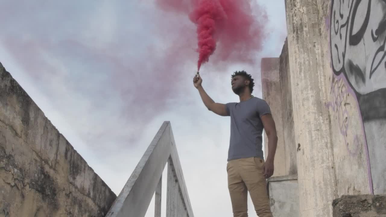 Stock Footage Urban Man Holding A Smoke Bomb Live Wallpaper - Free Download